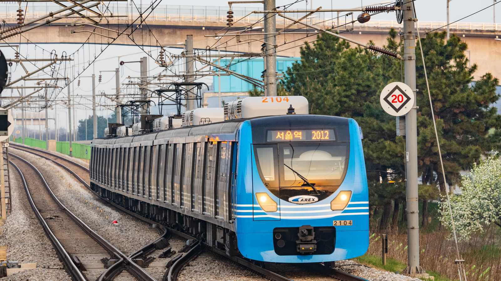 AREX airport train passing Gyeyang Station